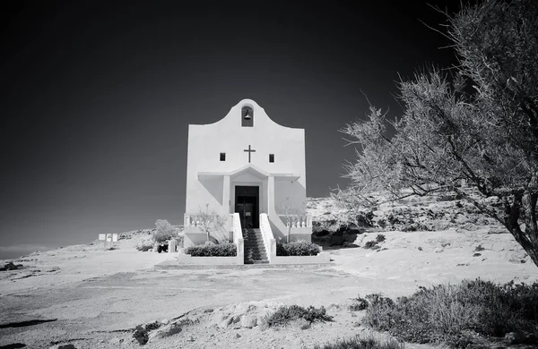 Small catholic church The Saint Anne or Sant\' Anna Chappella at Dwejra bay beach near Azure Window on Gozo Island black white, Malta
