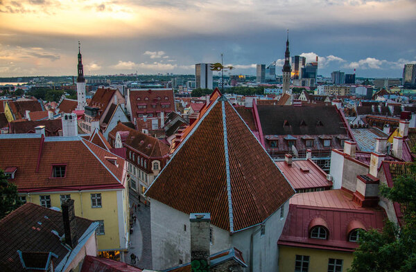 Panoramic view of Old Town of Tallinn with traditional red tile roofs, medieval churches, towers and walls, from Kohtuotsa Vaateplatvorm Toompea Hill, Estonia