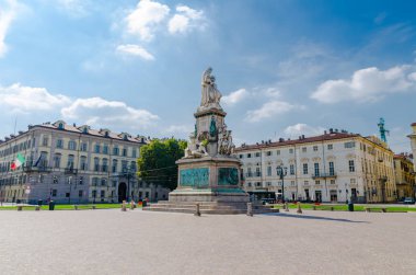 Monumento a Camillo Benso conte di Cavour statue on Piazza Carlo Emanuele II square with old buildings around in historical city centre of Turin Torino city in beautiful summer day, Piedmont, Italy clipart