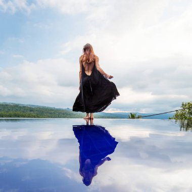 Beautiful woman by the pool
