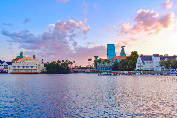 Orlando, Florida. February 09, 2019 . Panoramic view of Dance Hall and colorful hotel and villages on sunset background at Lake Buena Vista area.