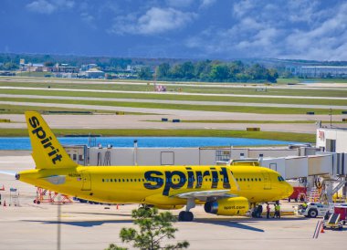Orlando, Florida 'da. 01 Mart 2019. Orlando Uluslararası Havaalanı (MCO) kapısında Spirit Airlines (NK) Uçak görünümü (6).