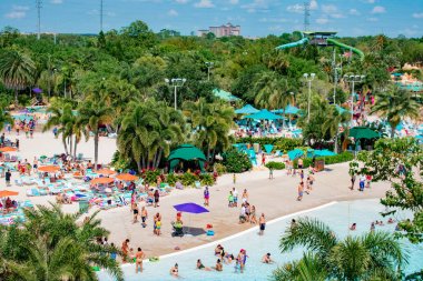 Orlando, Florida. April 07, 2019. Top view of people enjoying beaches , pools and water attractions at Aquatica (3) clipart