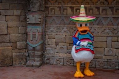 Orlando, Florida. May 16. 2019. Donald Duck in Mexican clothes at Epcot (3) clipart