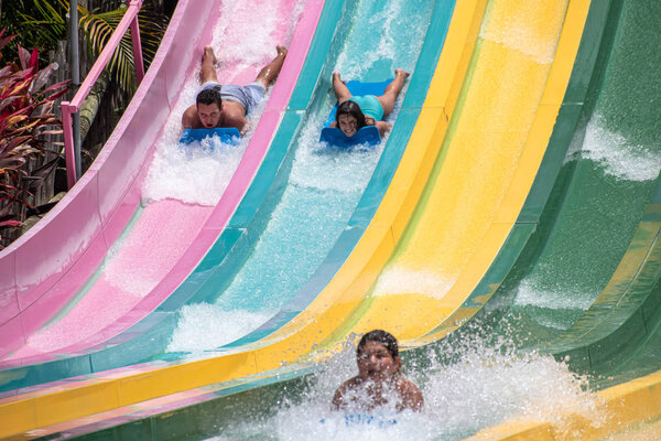 Orlando, Florida. July 01, 2019. People having fun in Taumata Racer attraction at Aquatica . It is the biggest thrill in the park 30