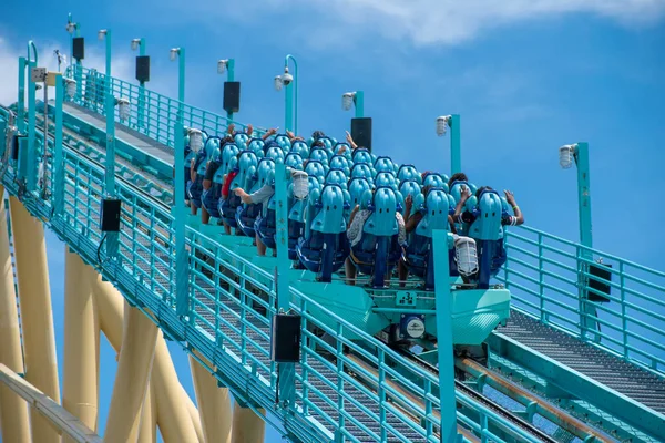 stock image Orlando, Florida . July 31, 2019. People enjoying amazing Kraken rollercoaster during summer vacation at Seaworld (18).