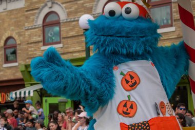 Orlando, Florida. September 21, 2019. Cookie Monster in Halloween Sesame Street Parade at Seaworld 2 clipart