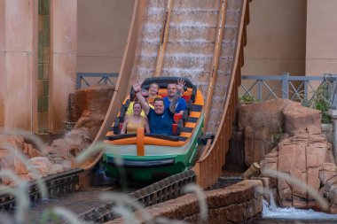 Orlando, Florida. September 30, 2019. People having fun Journey to Atlantis attraction at Seaworld 7 clipart