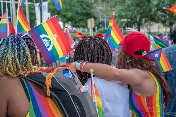 Orlando, Florida. October 12, 2019. Lesbian couple in Come Out With Pride Orlando parade at Lake Eola Park area (106)