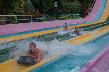 Orlando, Florida. October 24, 2019. People enjoying amazing Taumata Racer at Aquatica 3.j