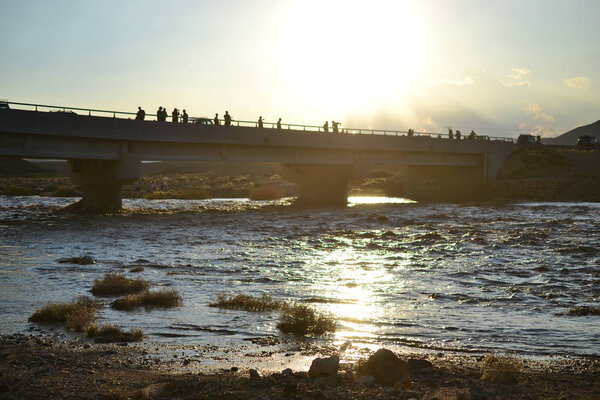 Huge Flash flood in Mitzpe Ramon Crater, Negev desert in South Israel, streams floods of water in the desert wilderness