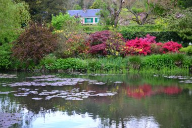 France Giverny Claude Monet garden in spring, flowers and lakes sea rose clipart