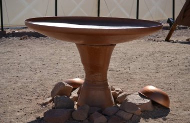 bronze washing bowl, Model of Tabernacle, tent of meeting in Timna Park, Negev desert, Eilat, Israel clipart