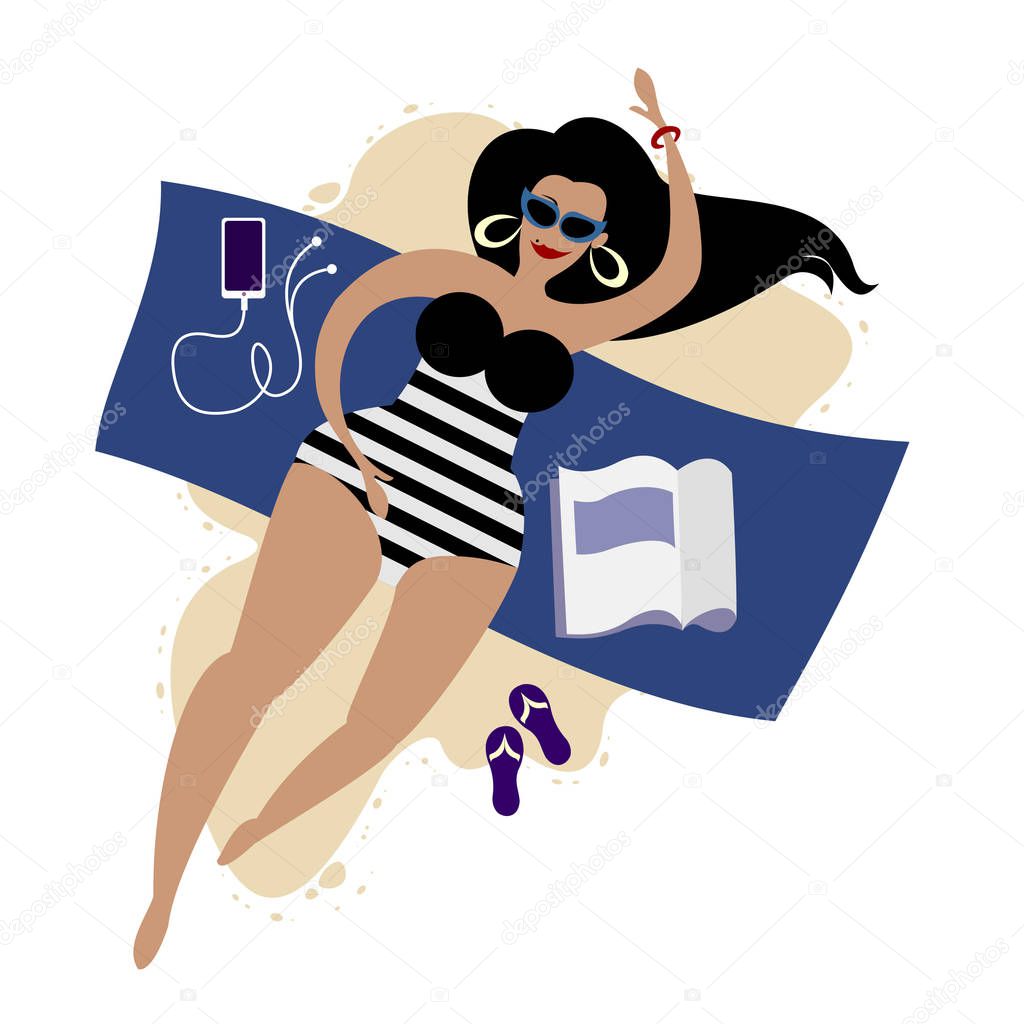 Body-positive plus size cute girl in a striped swimsuit with a phone and a magazine on the blanket takes a sunbath nearby the sea