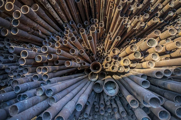 bunch of rust pipes is made one by one