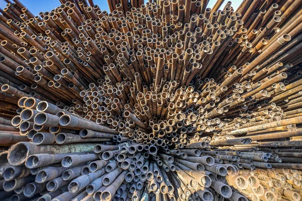 bunch of rust pipes is made one by one