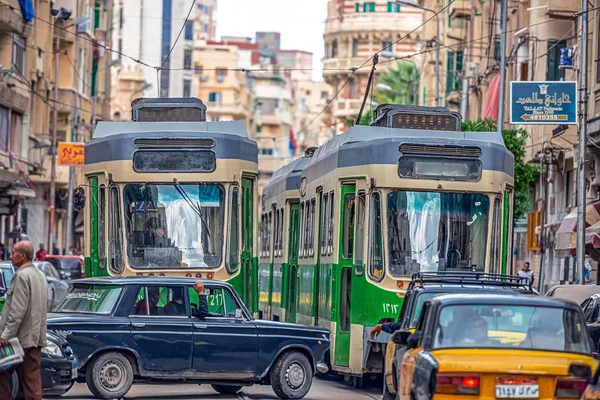 Stock image 16/11/2018 Alexandria, Egypt, the streets of an ancient African city filled with people and trams and old Soviet cars