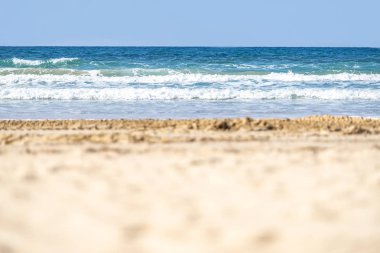 güneşli bir günde sıcak Seaside açık arka plan bulanık