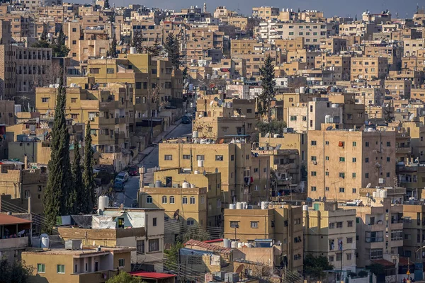 02/18/2019 Amman, Jordan, a view on the roofs of a huge city in the Middle East. A super-populated Muslim city