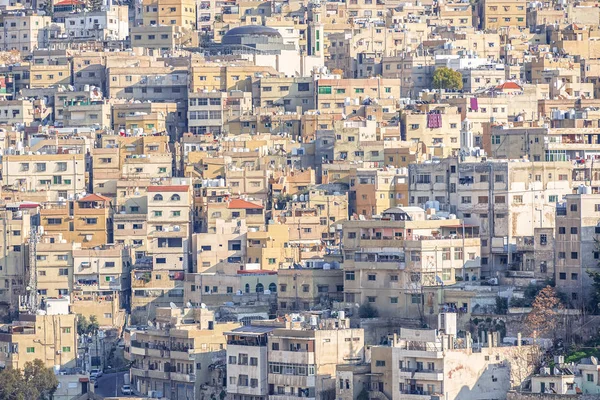 02/18/2019 Amman, Jordan, a view on the roofs of a huge city in the Middle East. A super-populated Muslim city