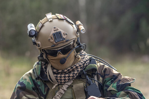 22 / 04 / 2019 Ukraine, Zhytomyr, American Special Forces fighter in a protective helmet in a woodland Camouflage
