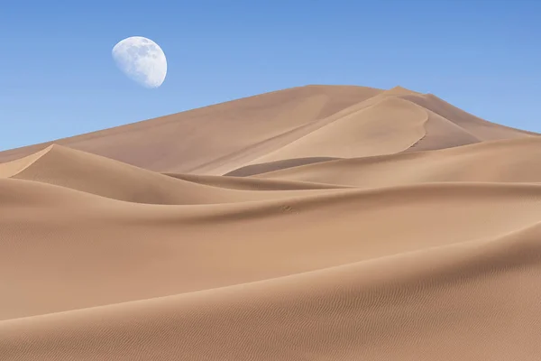 Dasht-e-Lut, Lut desert,hottest desert in the world, also known like Kalut Desert with full moon above horizon