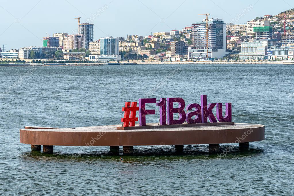 04/05/2019 Baku, Azerbaijan, Symbol of Formula 1 and F1 Logo in Baku Bay, Panoramic view of skyline and Caspian Sea Panorama