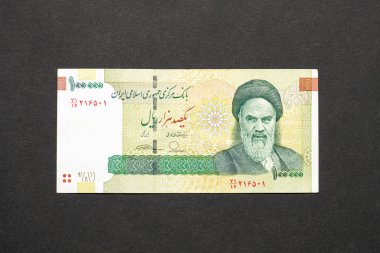 Humeyni Üzerinde 100000 Riyal banknot İran, Rial İran'ın ulusal para birimidir