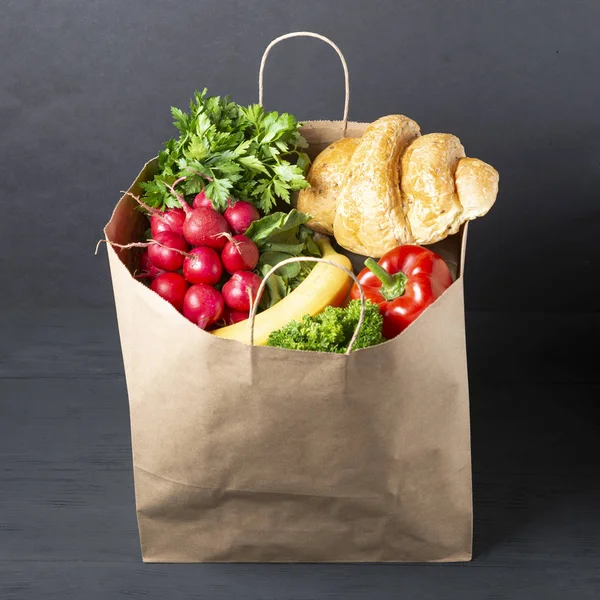Full Paper Bag Various Foods Vegetables Fruits Black Wooden Background — Stock Photo, Image