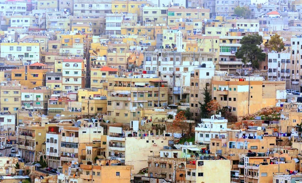View of the city of Amman in Jordan with its houses and roads in a sunny day.