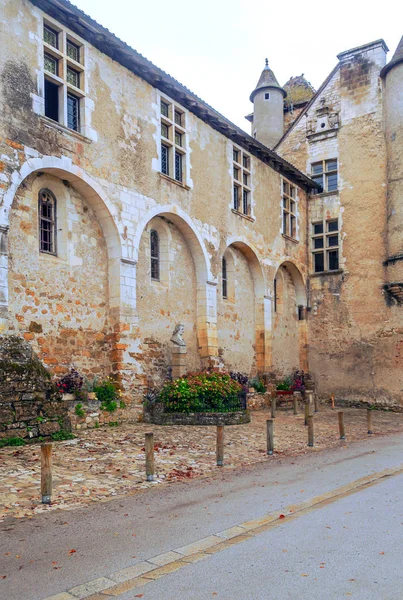 Medieval village of Aquitaine with its stone houses in the south of France on a cloudy day.