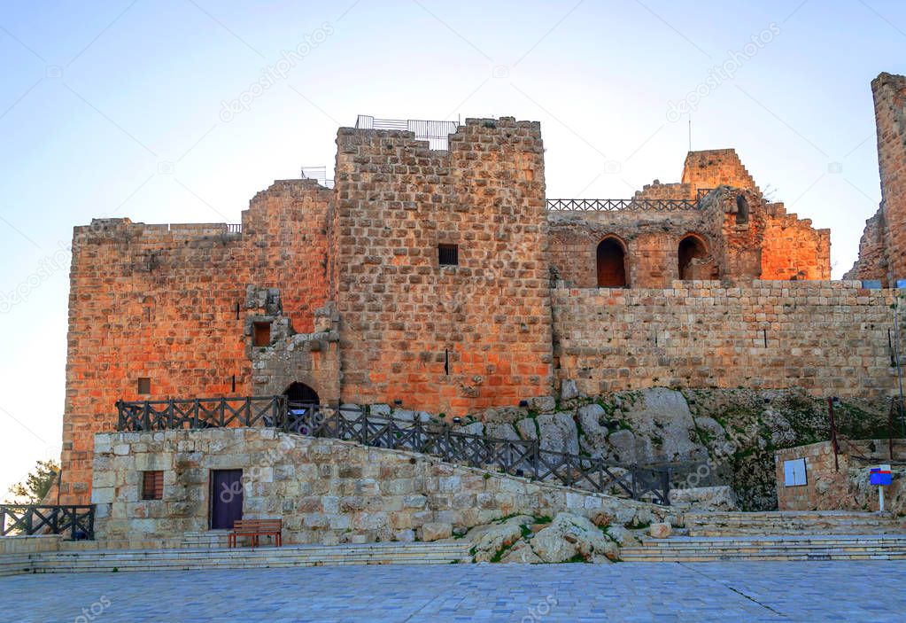 Ruins of Ajlun castle in Jordan on a sunny day.