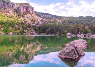 Lake in the Spanish province of Soria on a sunny day clipart