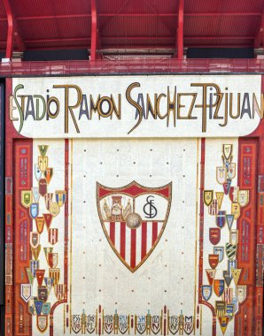 Coat of arms of Sevilla football club on a wall