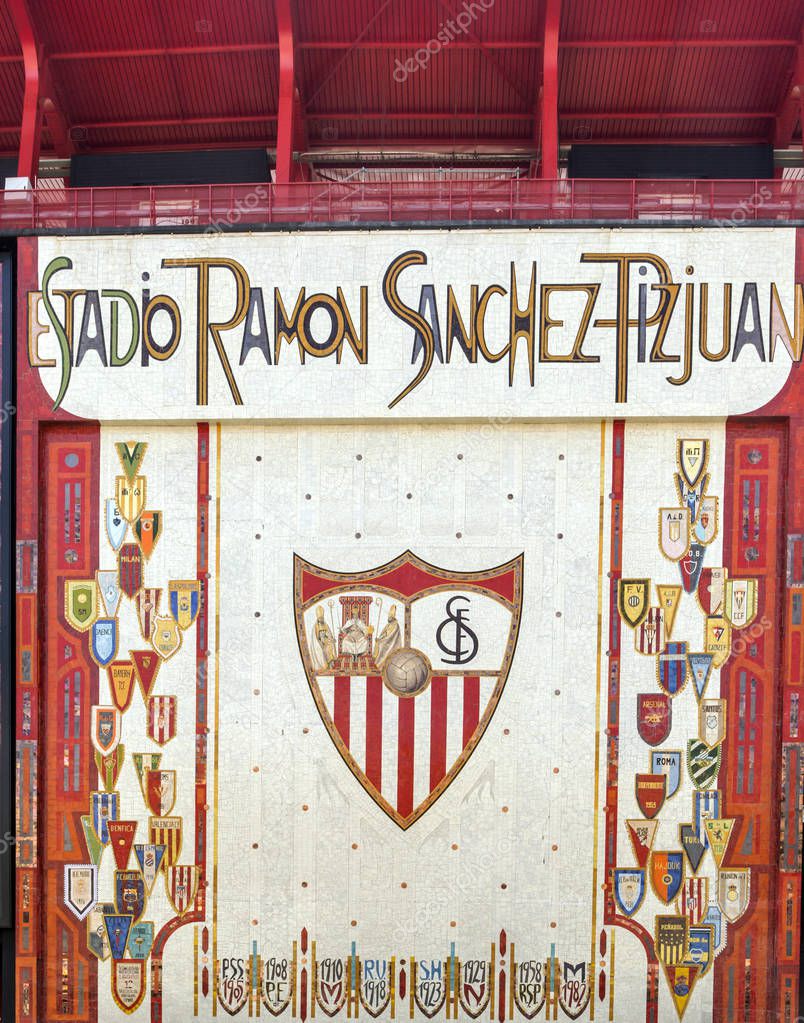 Coat of arms of Sevilla football club on a wall