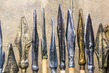 Spearheads in a medieval market in Pamplona, Spain. clipart