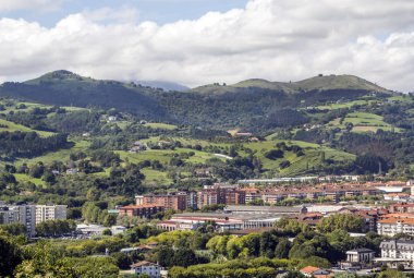 Zarautz in the Basque Country, Spain, on a sunny day with the mountains in the background