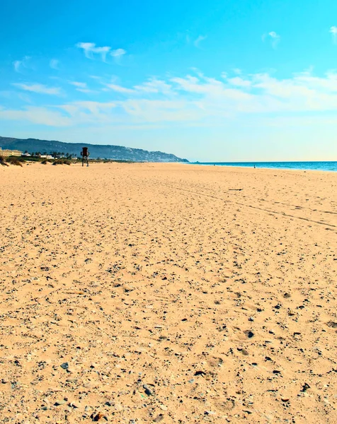 Άμμο με τη θάλασσα στο παρασκήνιο — Φωτογραφία Αρχείου