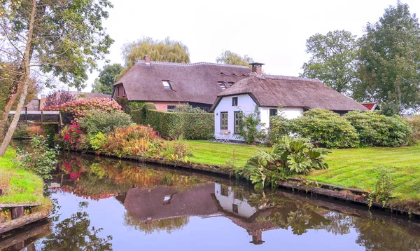 Giethoorn Village Of Holland With Canals And Rural Houses On A Cloudy Day Thatched Summer Stock Photo 234552298