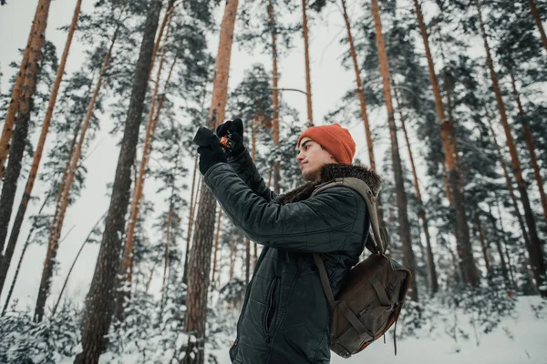 Photographer take picture in forest