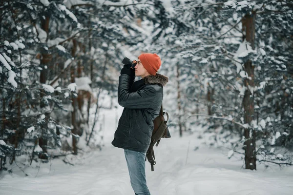 Photographer take picture in forest