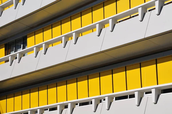 Yellow canvas blinds at a facade — Stock Photo, Image