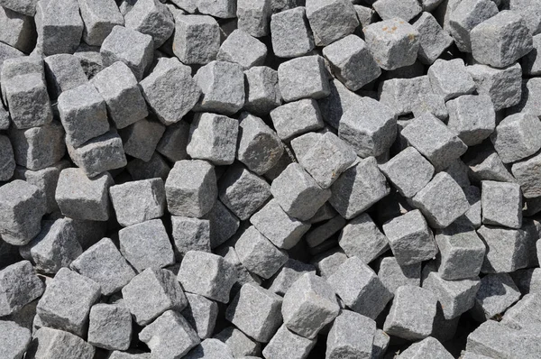 Close-up of a heap of granite sett stones — Stock Photo, Image
