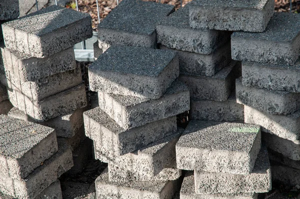 Concrete paving stones stacked at construction site — Stock Photo, Image