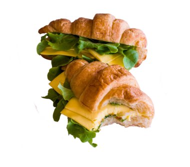 İzole edilmiş Top View yeni kruvasan beyaz arka planda kırpma yolu ile. Kahvaltı için uygun bir Fransız pastası türüdür. Dünya çapında bir pastaneden alınabilir..