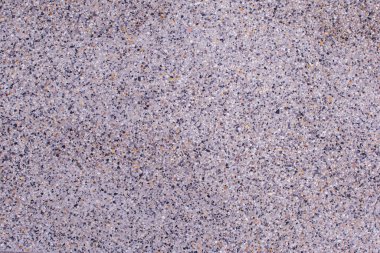 Küçük kum taşından yapılmış doğal renk kum temizleme yüzeyi. Arkaplan dokusu için resim.