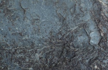 Mavi bir taşın üzerinde desen. Doğal arka plan. Taş doku