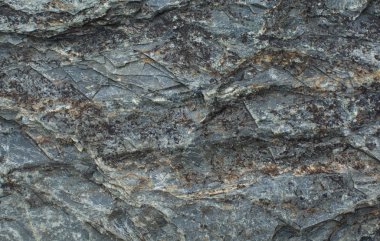 Mavi bir taşın üzerinde desen. Doğal arka plan. Taş doku