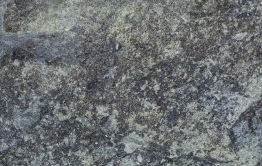 Mavi bir taşın üzerinde desen. Doğal arka plan. Taş doku