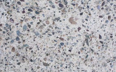 White stone. Multicolored kashki. Natural background. Bulk texture